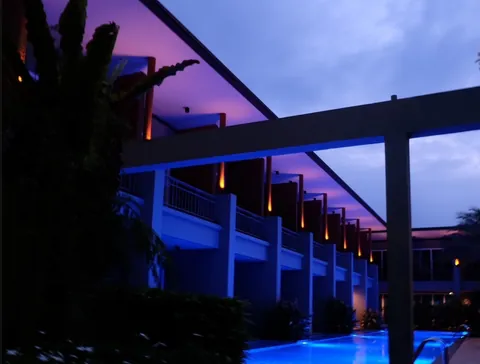 Poolside balconies after sunset