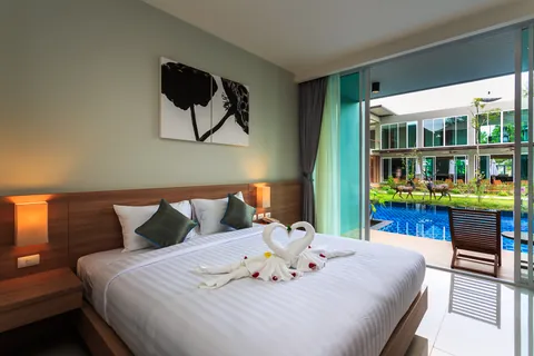 Guest bedroom with pool view
