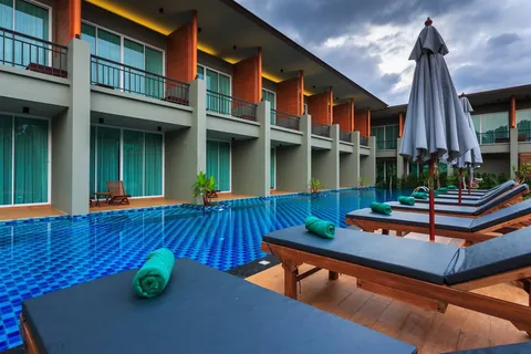 Sun loungers beside the swimming pool