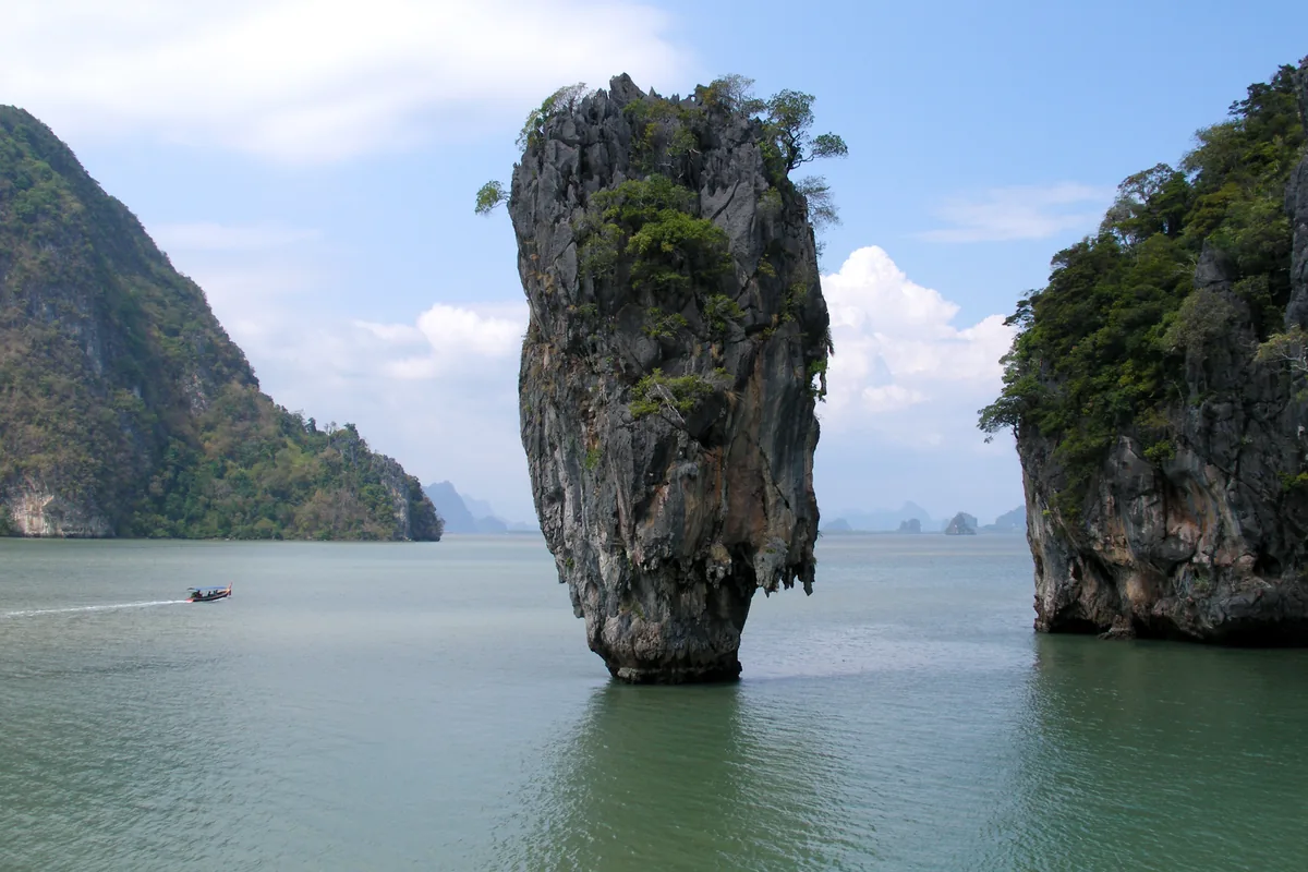 Khao Tapu limestone tower rising from the water in Phang Nga Bay